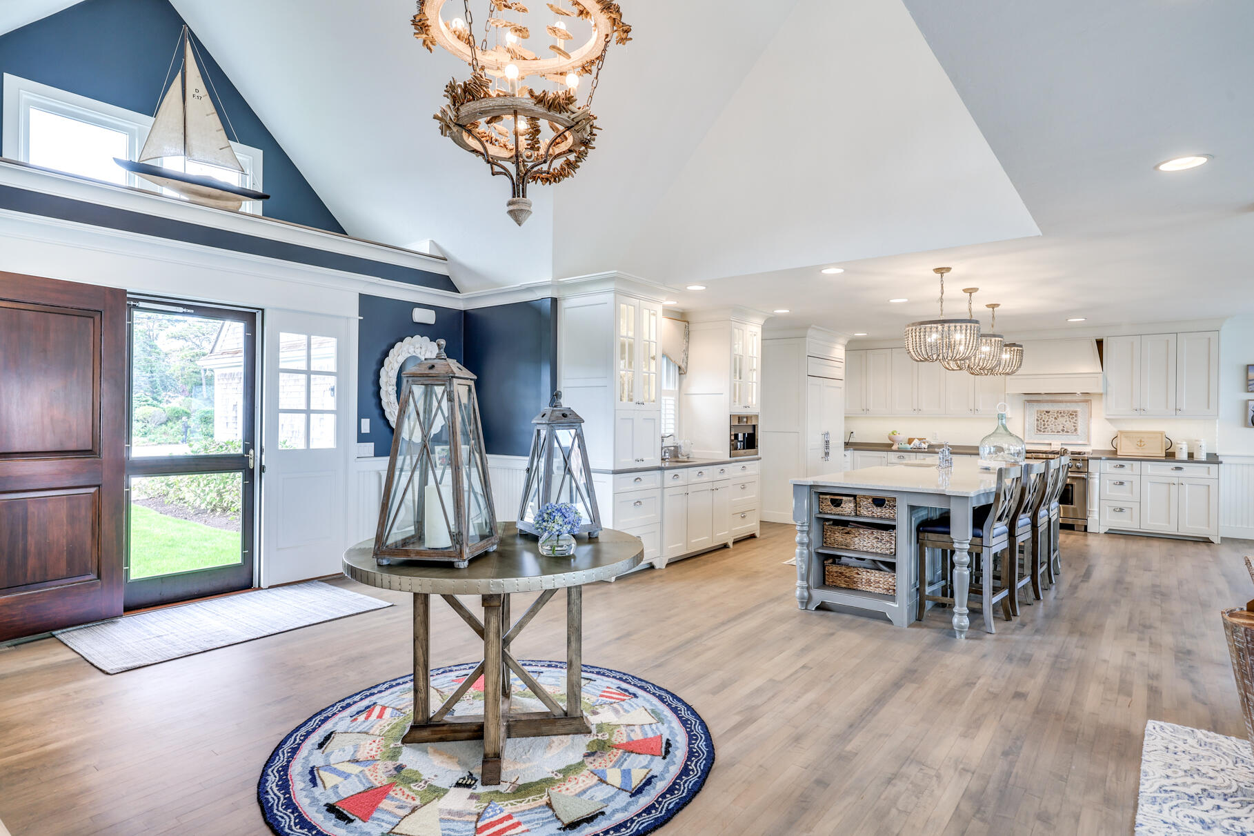 75 Shore Road West Harwich, MA 02671 - Photo 14 of 53 a living room with furniture a dining table and a large window