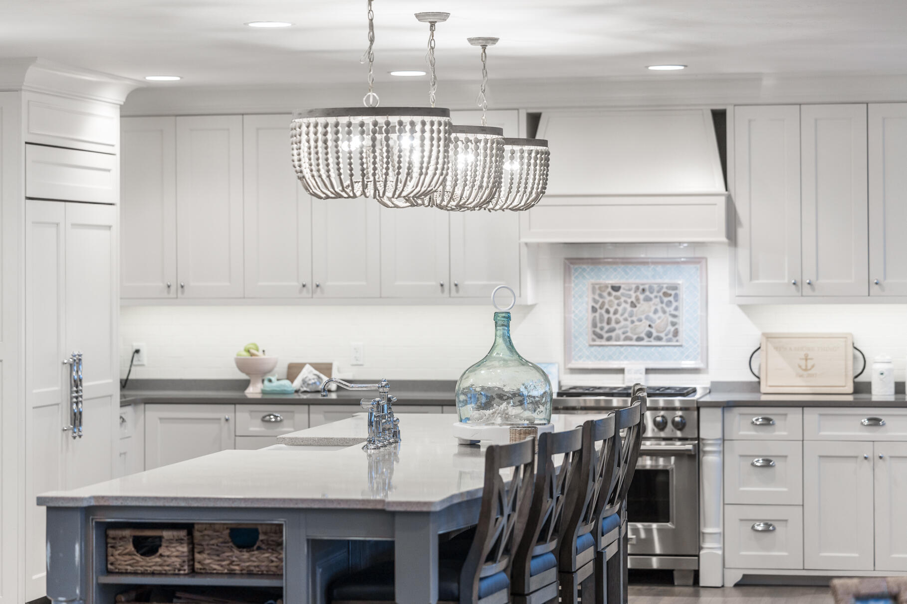 75 Shore Road West Harwich, MA 02671 - Photo 18 of 53 a kitchen with cabinets and chandelier