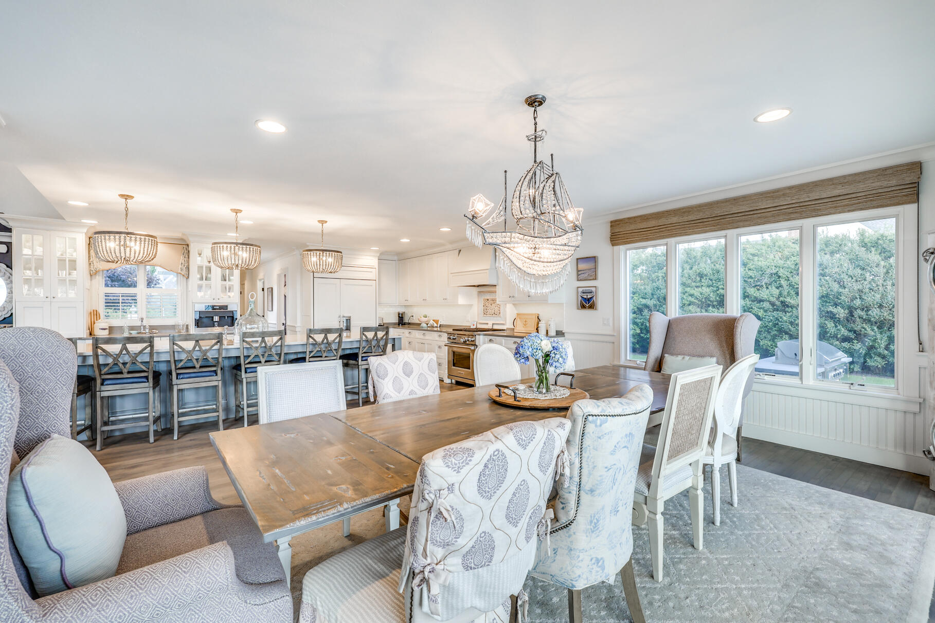 75 Shore Road West Harwich, MA 02671 - Photo 21 of 53 a dining room with furniture a chandelier and window