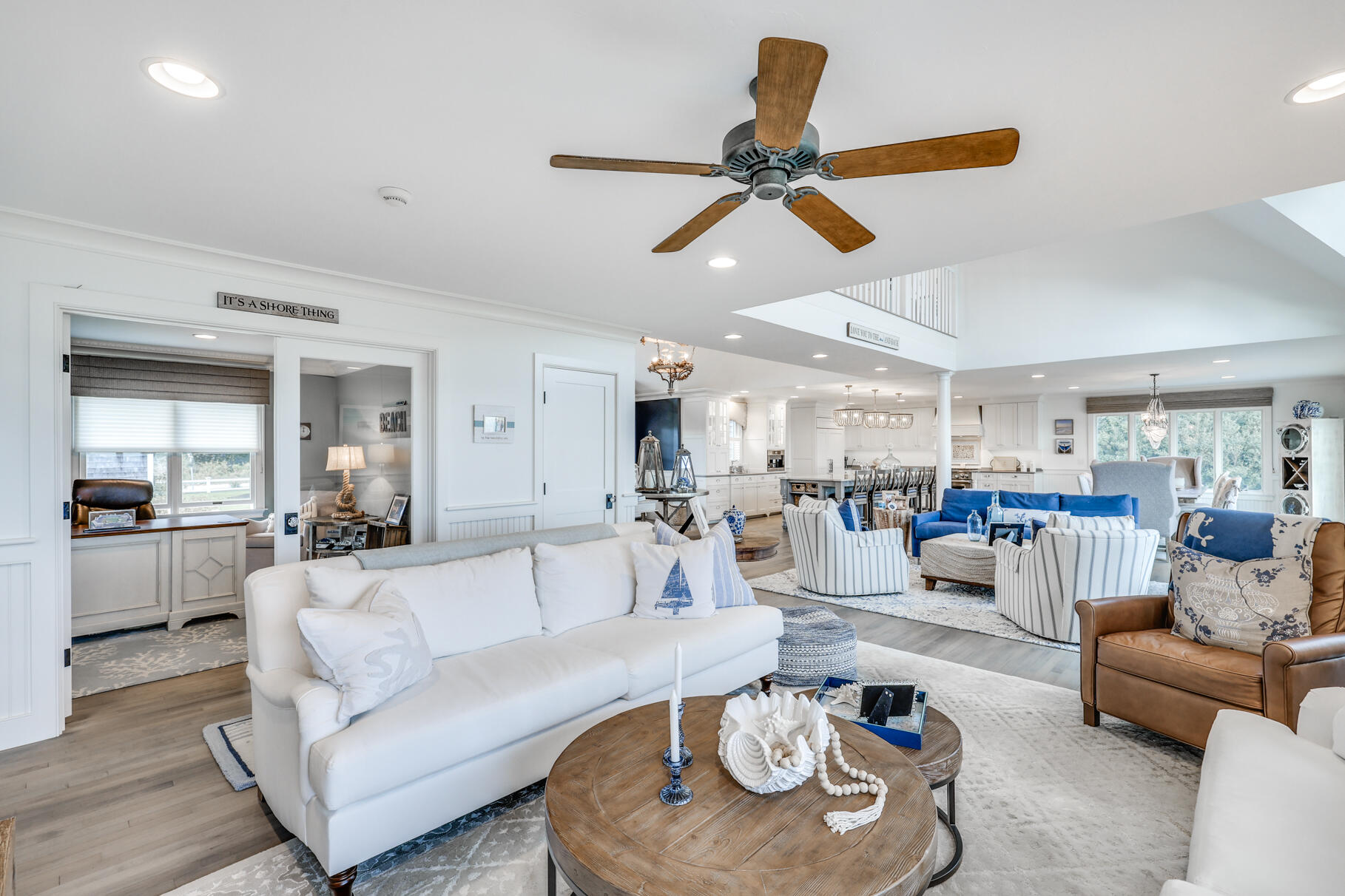 75 Shore Road West Harwich, MA 02671 - Photo 23 of 53 a living room with furniture and a large window