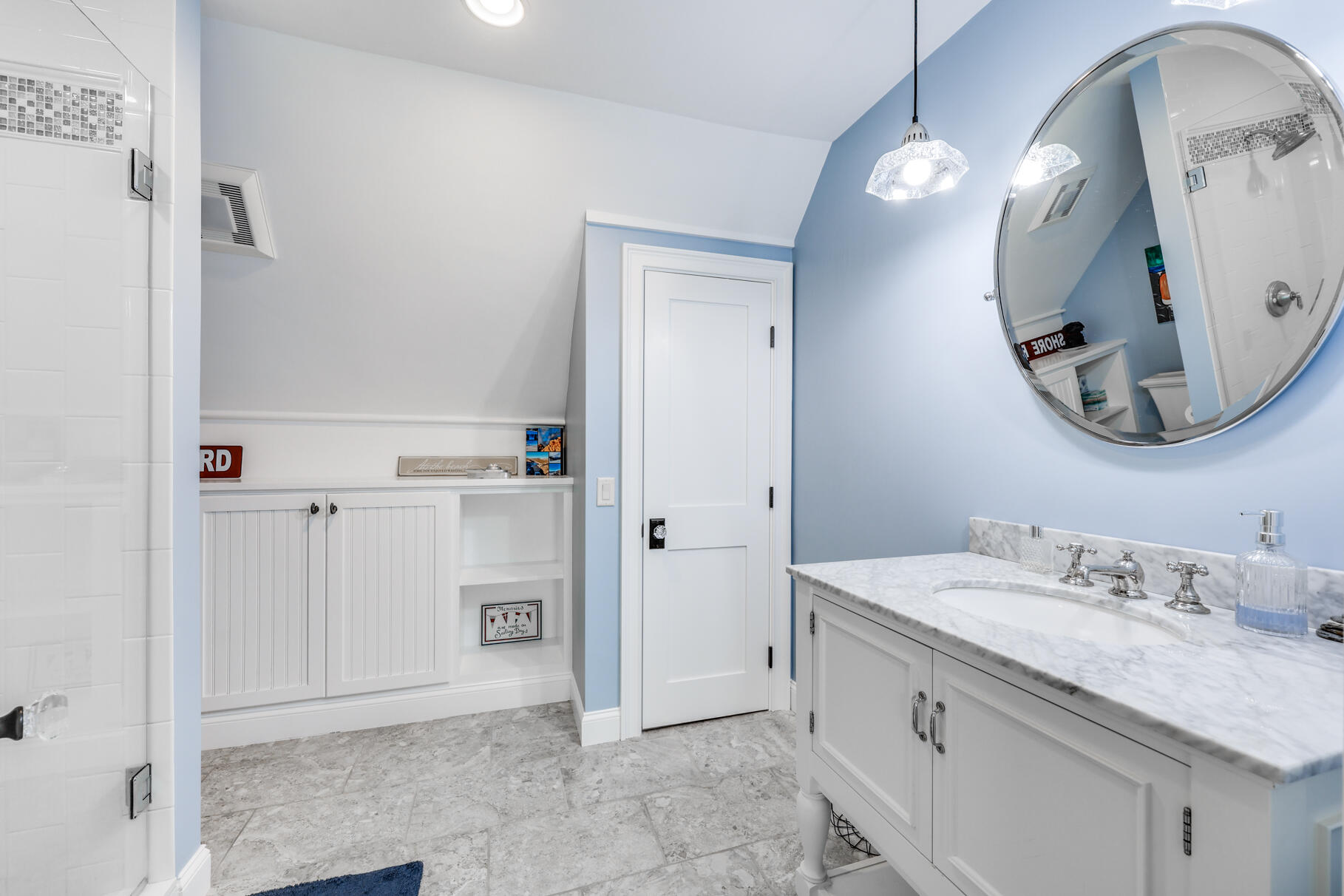 75 Shore Road West Harwich, MA 02671 - Photo 37 of 53 a spacious bathroom with a double vanity sink and a mirror