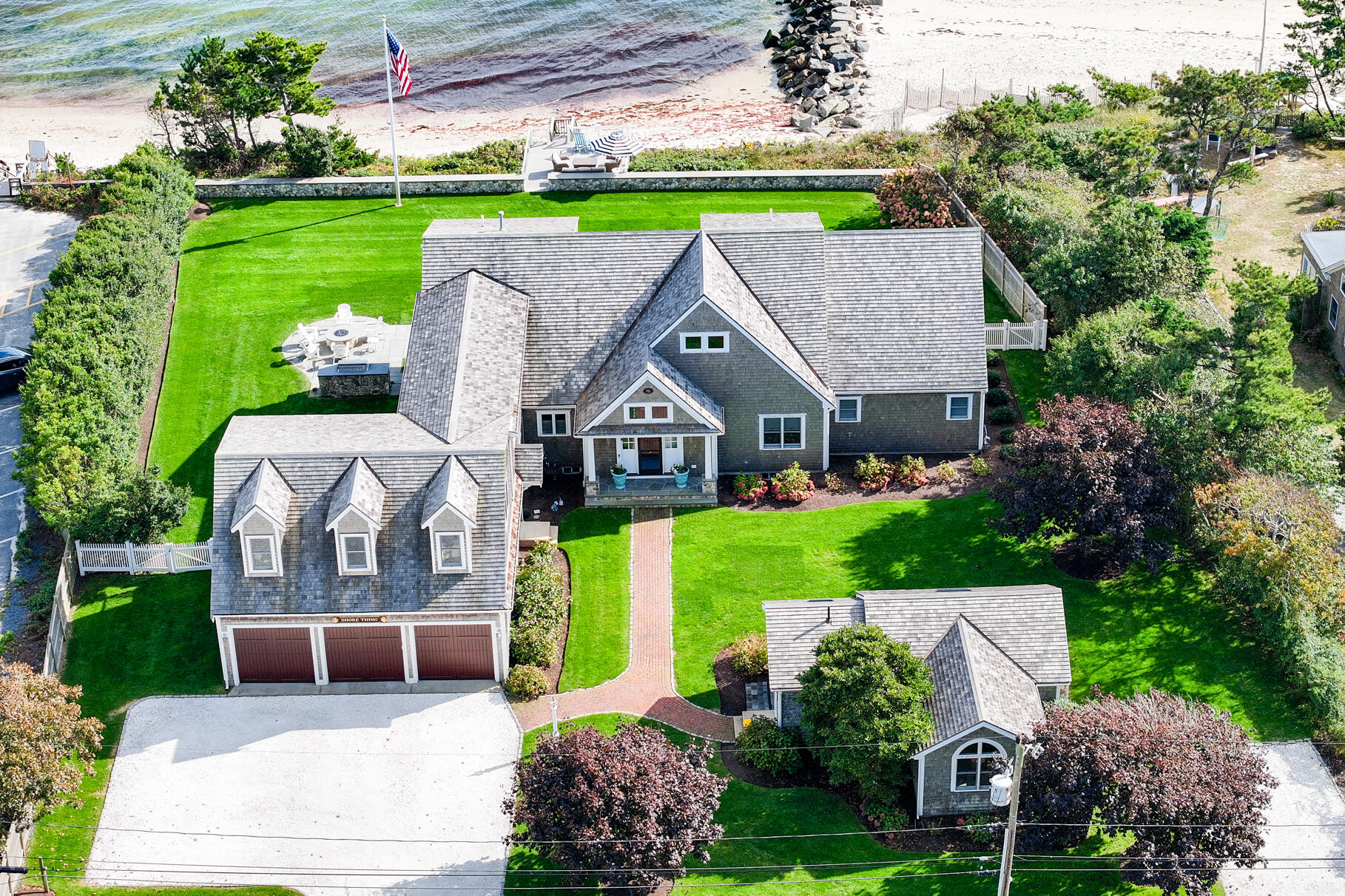 75 Shore Road West Harwich, MA 02671 - Photo 4 of 53 a aerial view of a house with a big yard and a garden