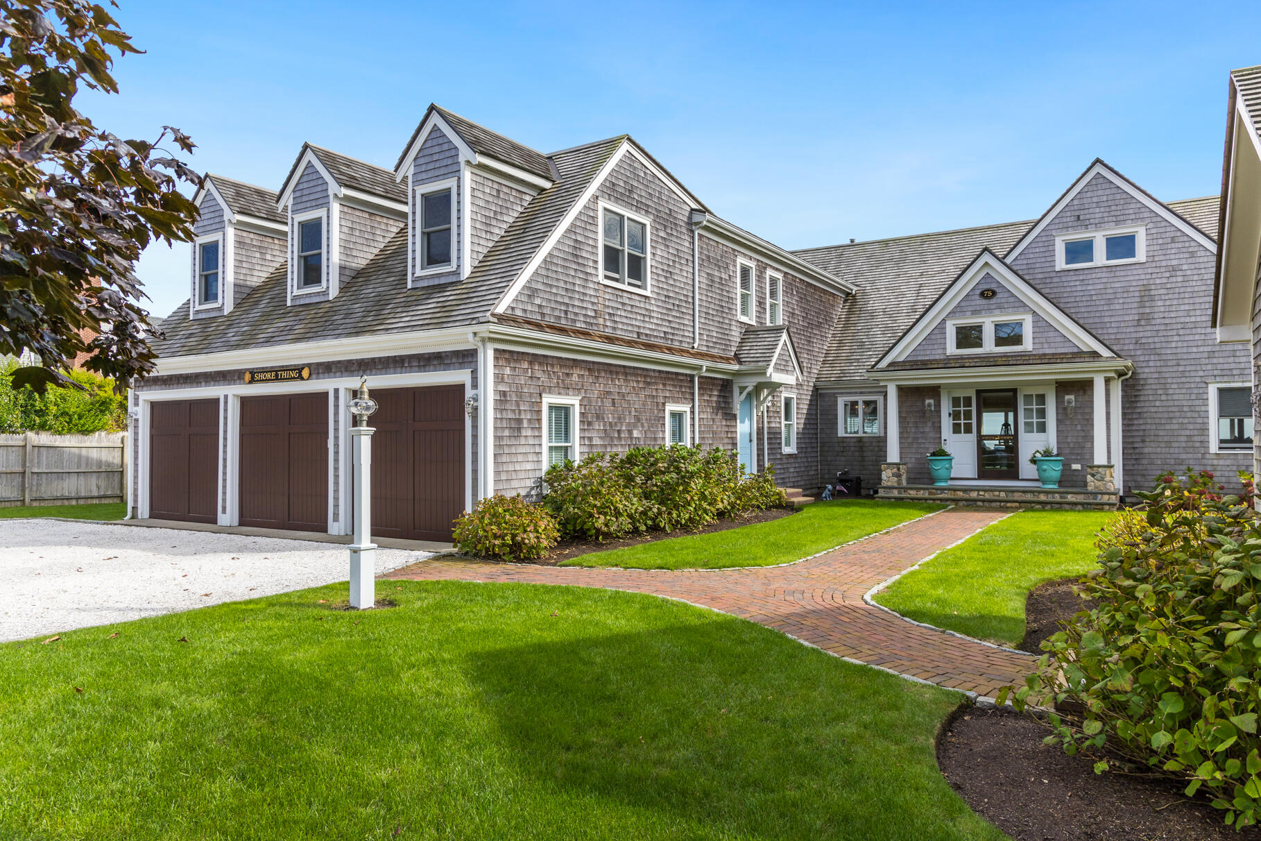 75 Shore Road West Harwich, MA 02671 - Photo 5 of 53 front view of a house with a yard