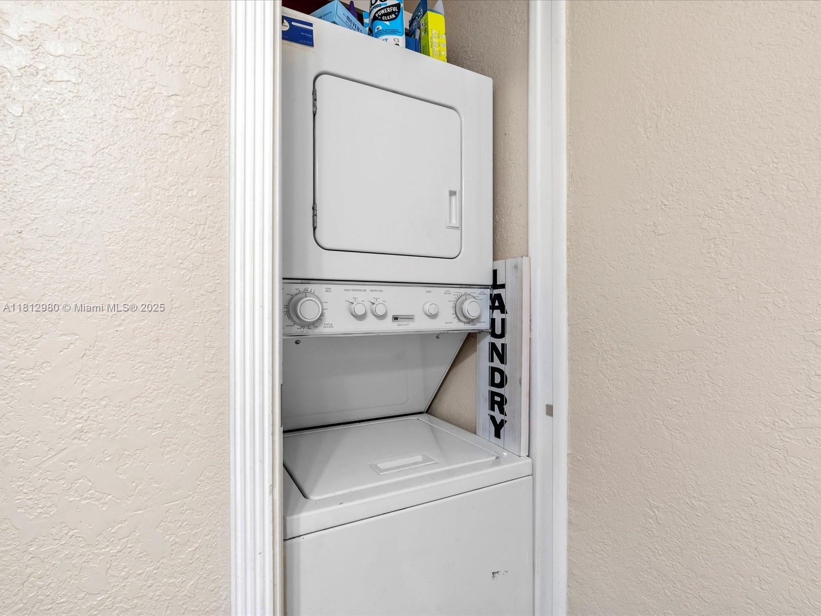 3097 Bird Avenue, Unit 3097 Miami, FL 33133 - Photo 13 of 29 a utility room with dryer and washer