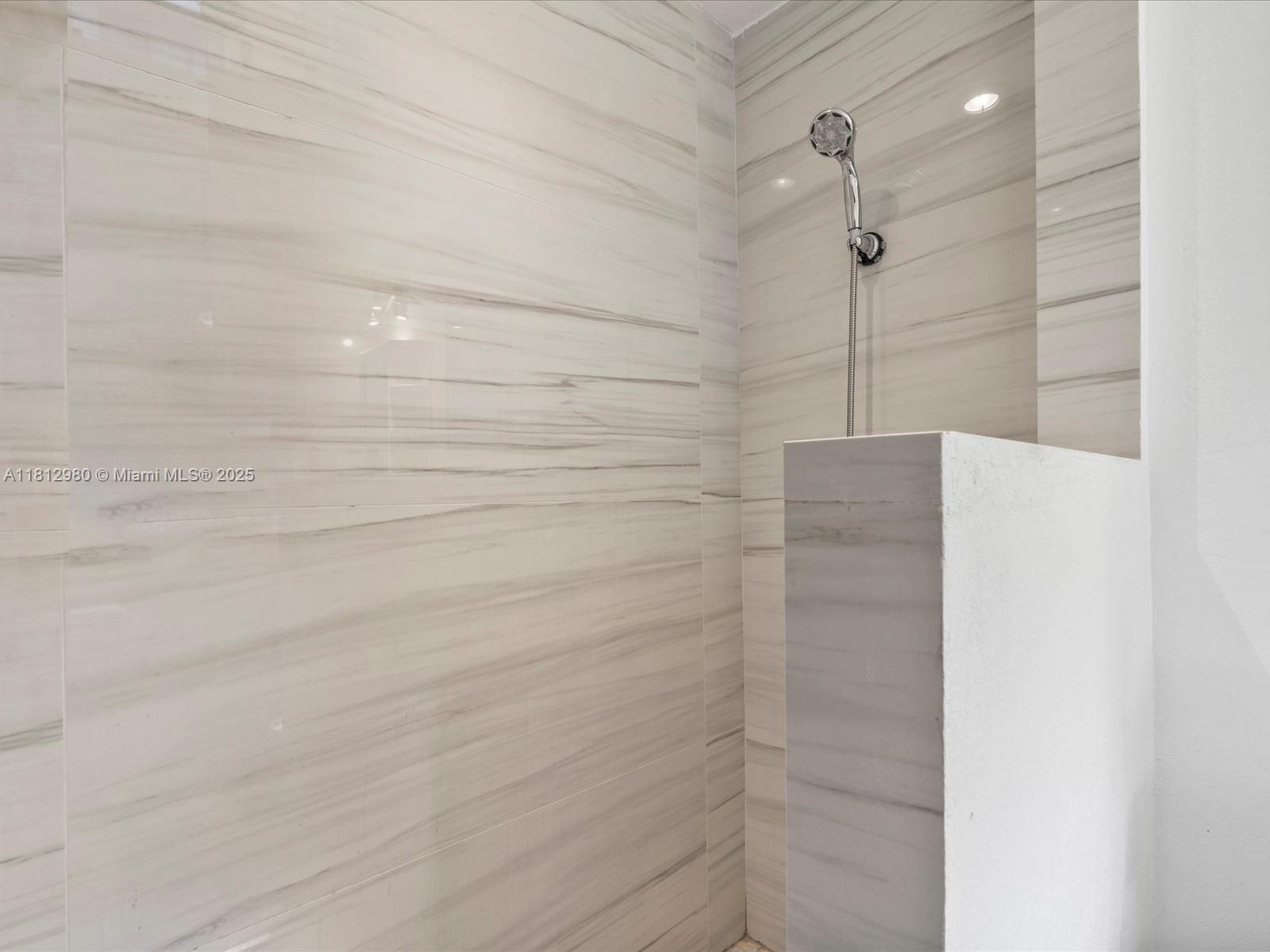 3097 Bird Avenue, Unit 3097 Miami, FL 33133 - Photo 18 of 29 a bathroom with a shower
