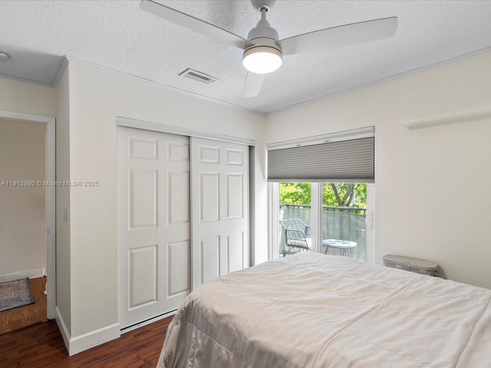3097 Bird Avenue, Unit 3097 Miami, FL 33133 - Photo 20 of 29 a bedroom with a large bed and a window