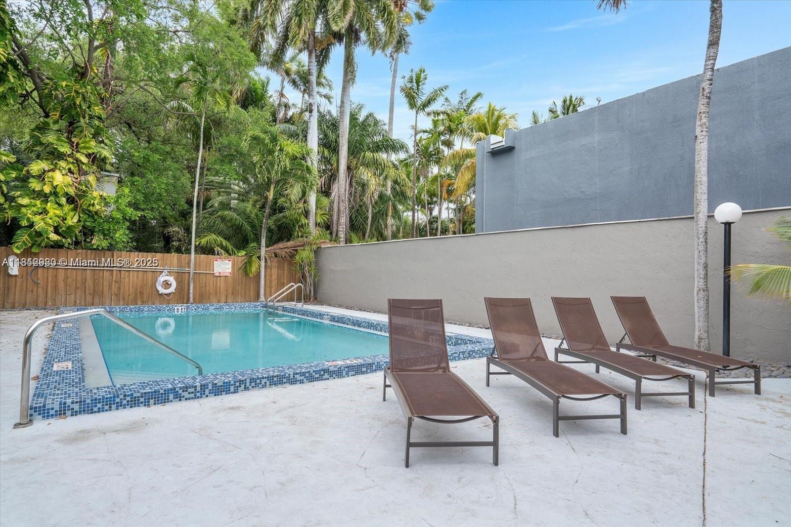 3097 Bird Avenue, Unit 3097 Miami, FL 33133 - Photo 27 of 29 a view of backyard with seating space