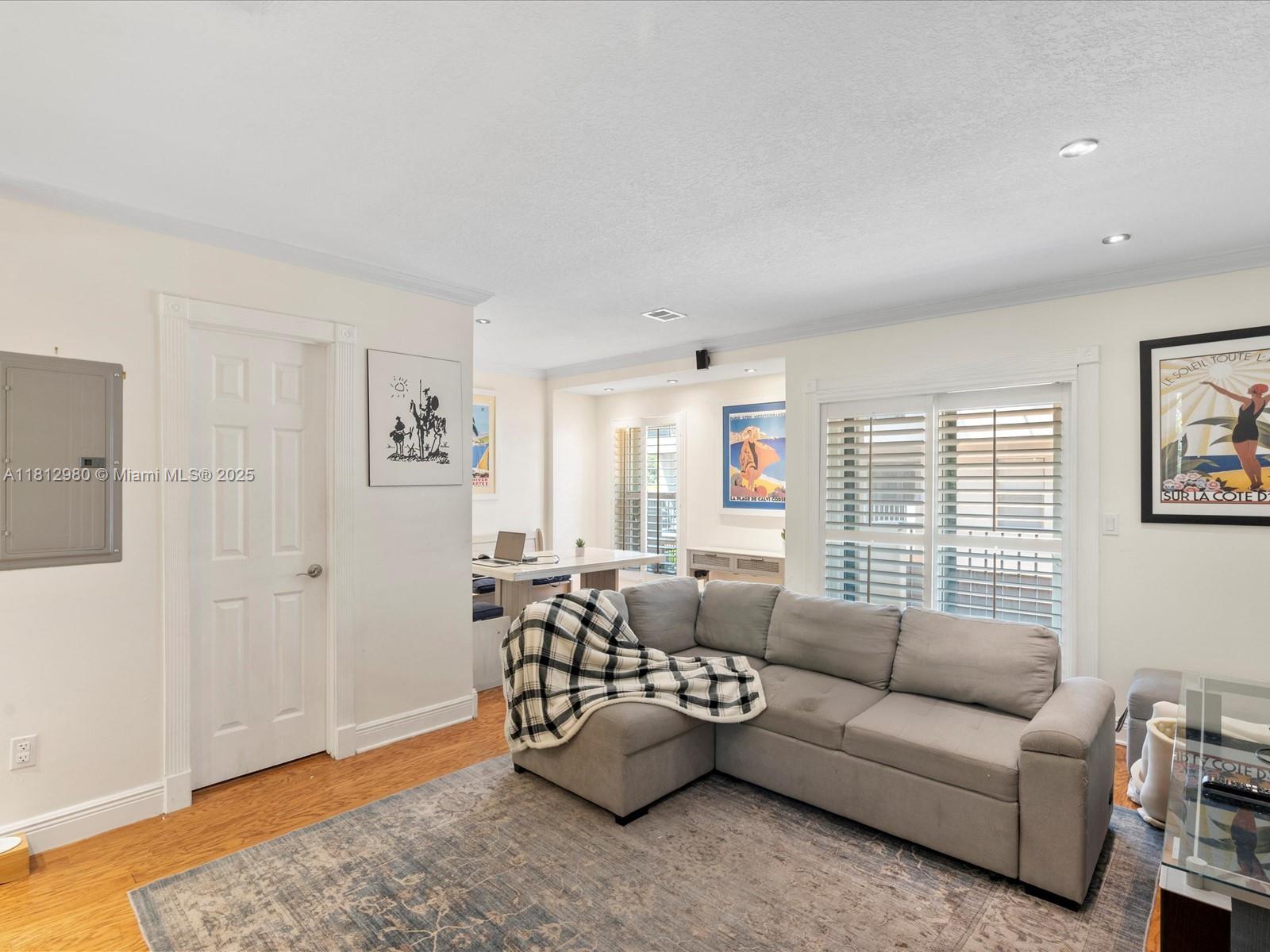 3097 Bird Avenue, Unit 3097 Miami, FL 33133 - Photo 4 of 29 a living room with furniture and a window