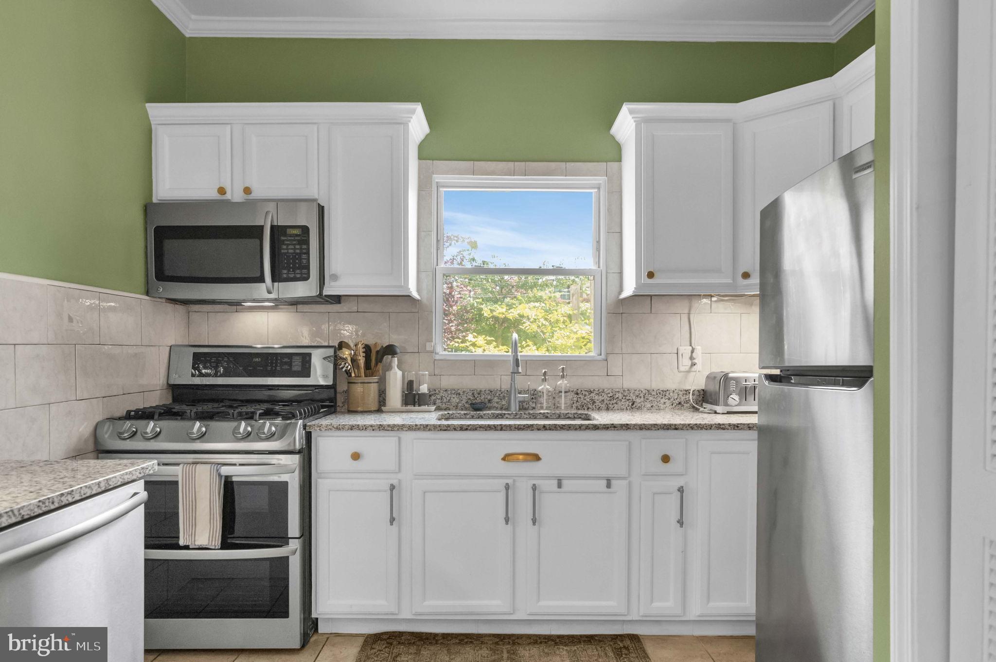 1526 Gales Street Northeast Washington, DC 20002 - Photo 13 of 35 Bright and inviting kitchen with modern finishes.