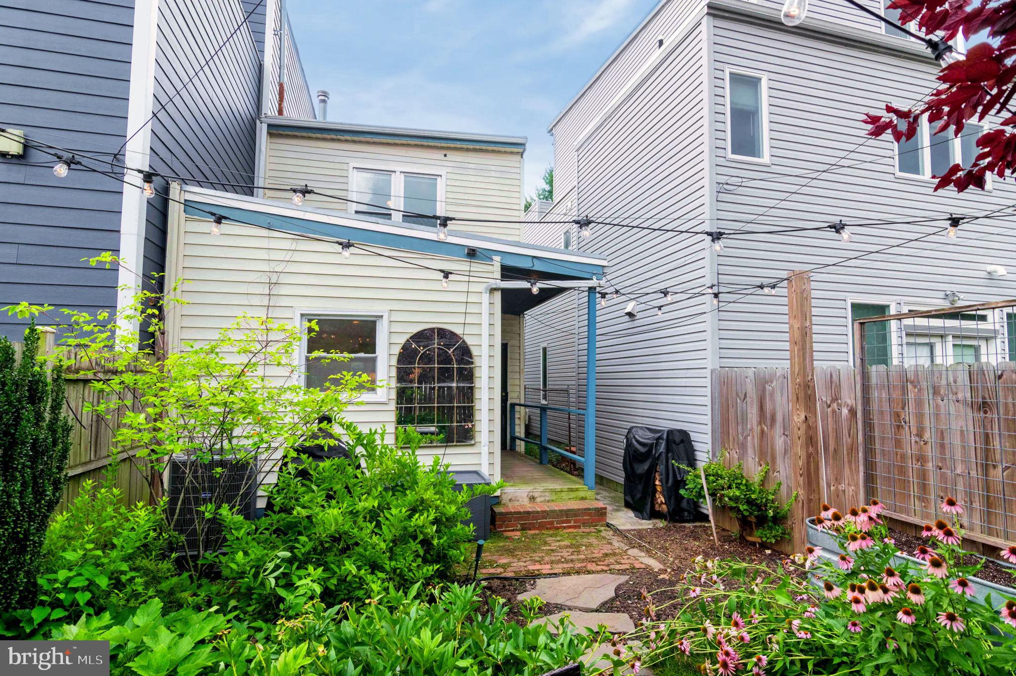 1526 Gales Street Northeast Washington, DC 20002 - Photo 31 of 35 Charming backyard oasis with lush greenery.