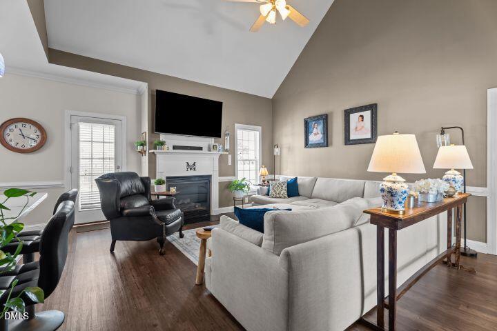 4240 Merck Road Wilson, NC 27893 - Photo 11 of 47 a living room with furniture fireplace and a flat screen tv