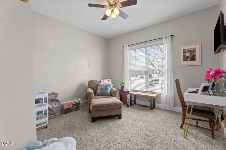 4240 Merck Road Wilson, NC 27893 - Photo 30 of 47 a living room with furniture and a window
