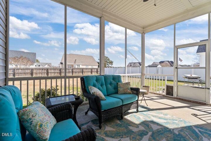4240 Merck Road Wilson, NC 27893 - Photo 32 of 47 a living room with furniture city view and wooden floor