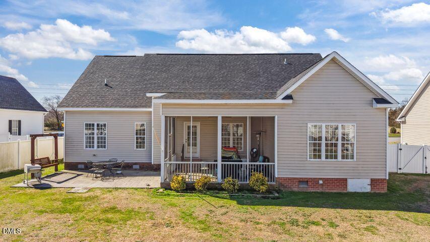4240 Merck Road Wilson, NC 27893 - Photo 39 of 47 a view of a house with a yard