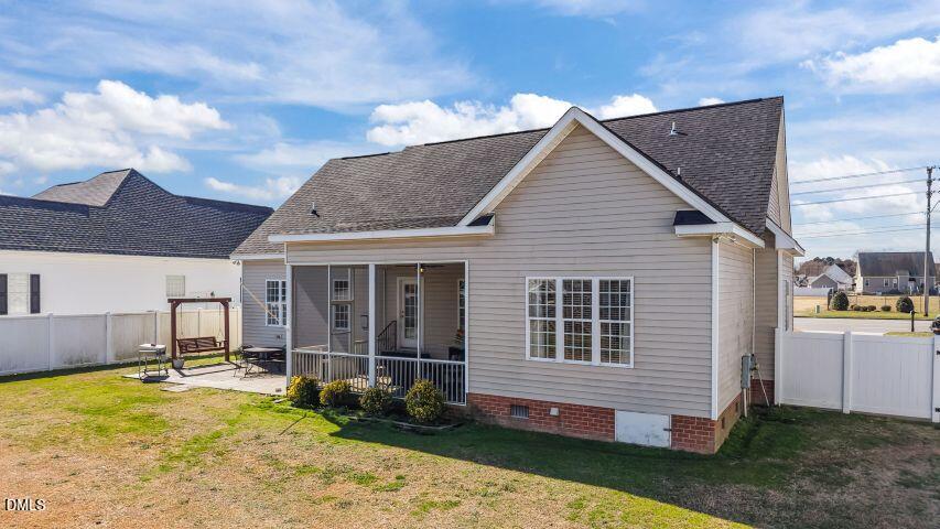4240 Merck Road Wilson, NC 27893 - Photo 40 of 47 a view of a house with a yard and sitting area