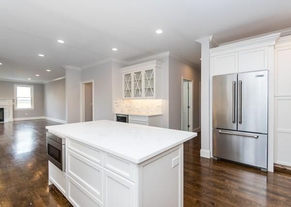 35 Sachem Road Needham, MA 02494 - Photo 1 of 21 a kitchen with stainless steel appliances a refrigerator sink and wooden floor
