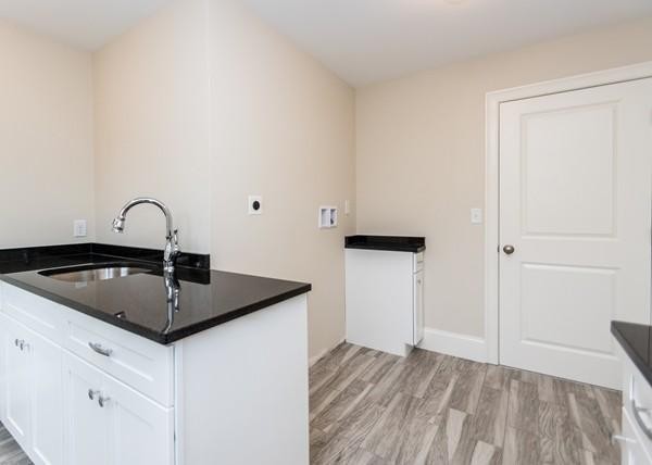 35 Sachem Road Needham, MA 02494 - Photo 16 of 21 a kitchen with a sink and cabinets