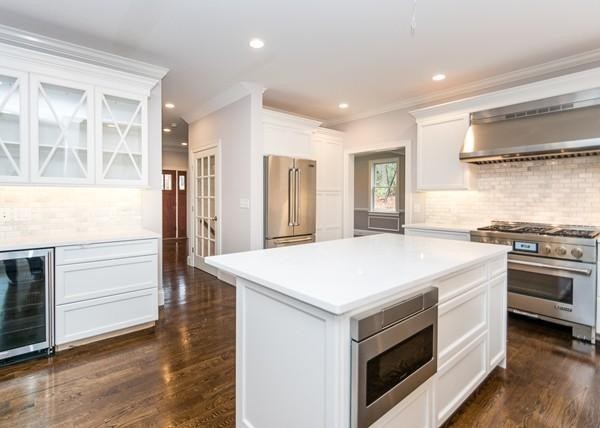 35 Sachem Road Needham, MA 02494 - Photo 3 of 21 a kitchen with a stove and a refrigerator
