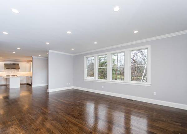 35 Sachem Road Needham, MA 02494 - Photo 6 of 21 a view of an empty room with wooden floor and a window