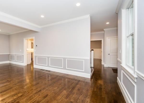 35 Sachem Road Needham, MA 02494 - Photo 10 of 21 wooden floor in an empty room with a window