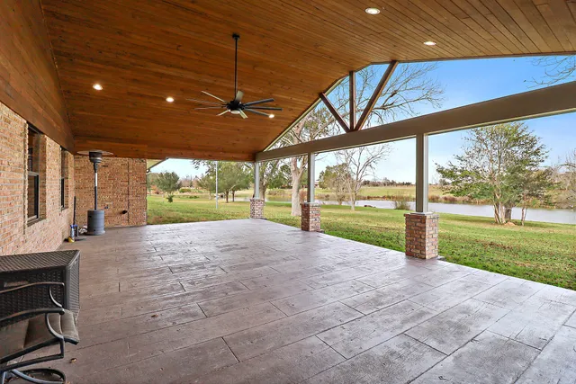 a view of a porch and garden