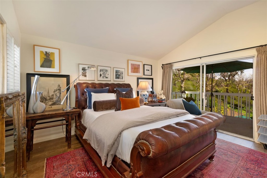14 Pickney Close Laguna Niguel, CA 92677 - Photo 7 of 22 a bedroom with a bed and a large window