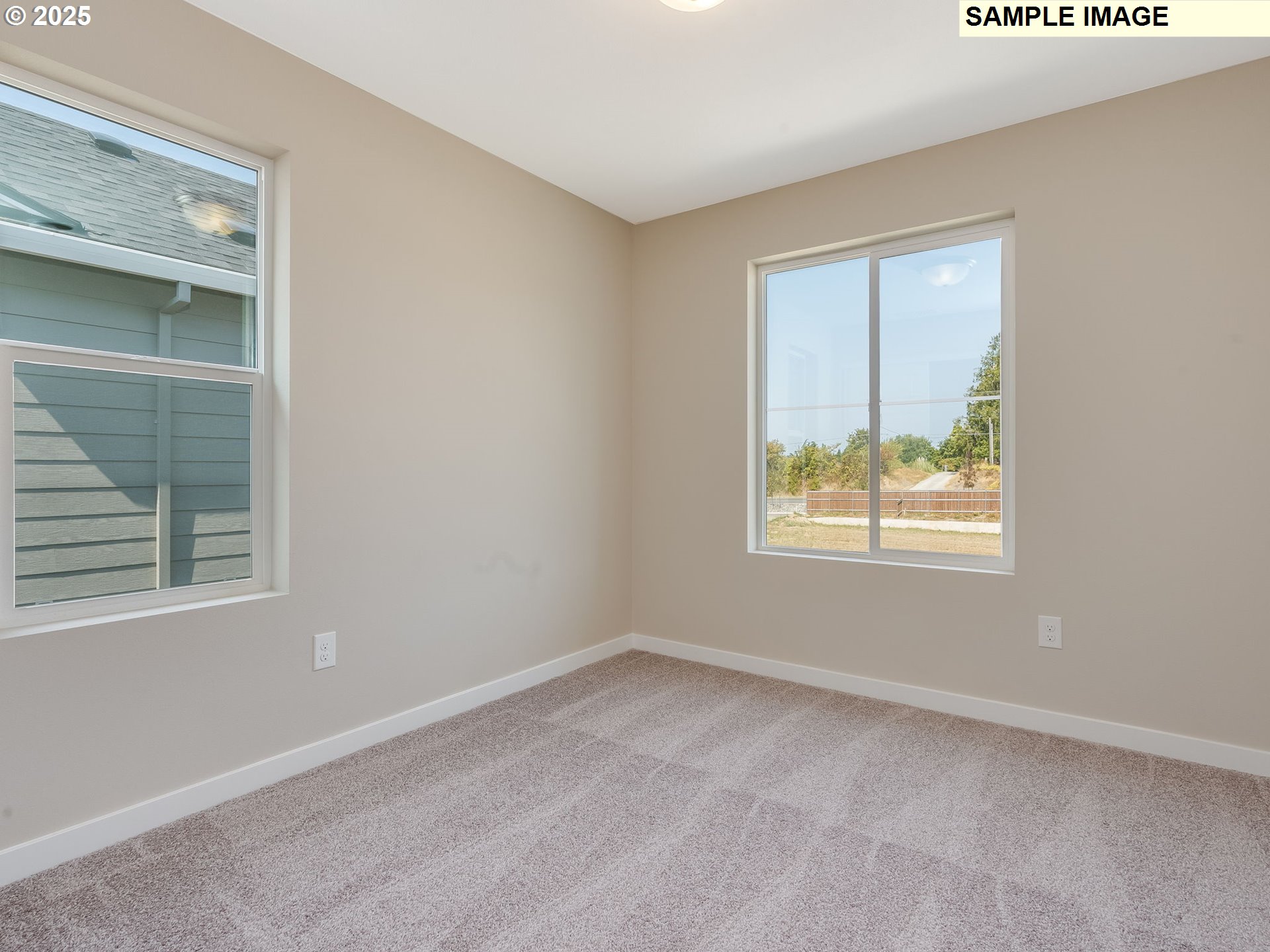 831 Northwest 178th Street Ridgefield, WA 98642 - Photo 21 of 37 an empty room with a window