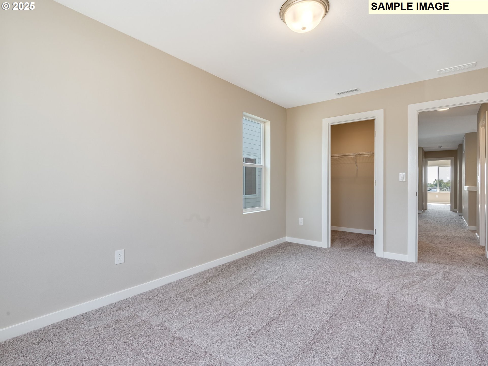 831 Northwest 178th Street Ridgefield, WA 98642 - Photo 22 of 37 a view of an empty room with closet and window