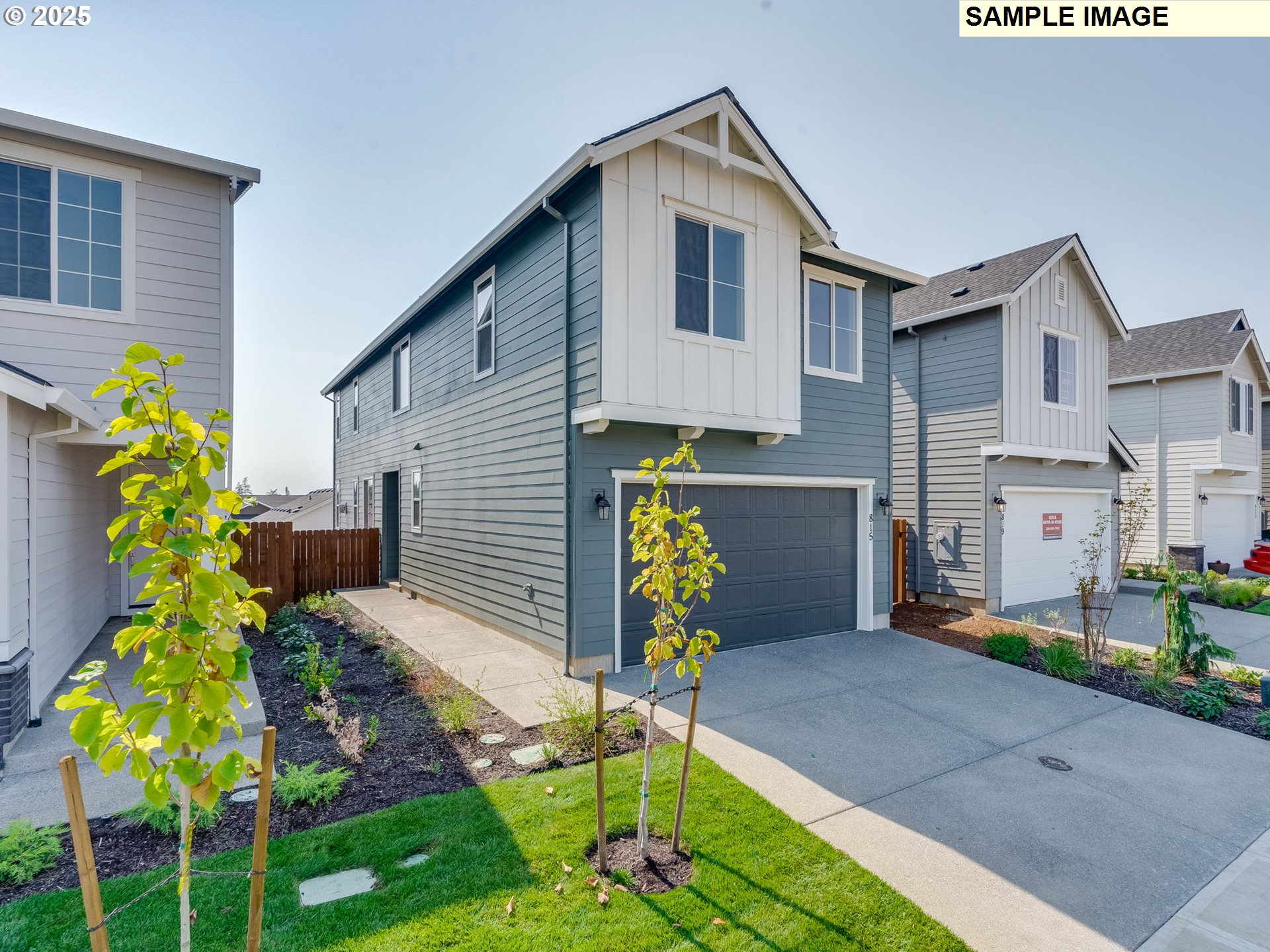 831 Northwest 178th Street Ridgefield, WA 98642 - Photo 23 of 37 a front view of a house with garden