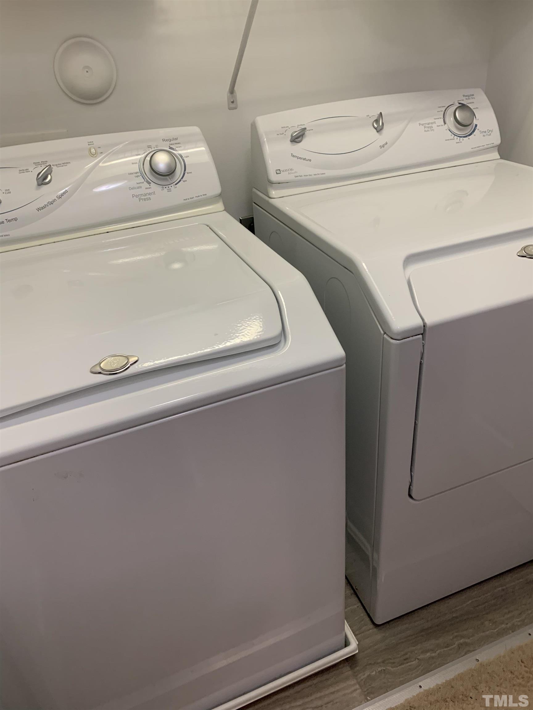7845 Spungold Street Raleigh, NC 27617 - Photo 32 of 37 a utility room with dryer and washer