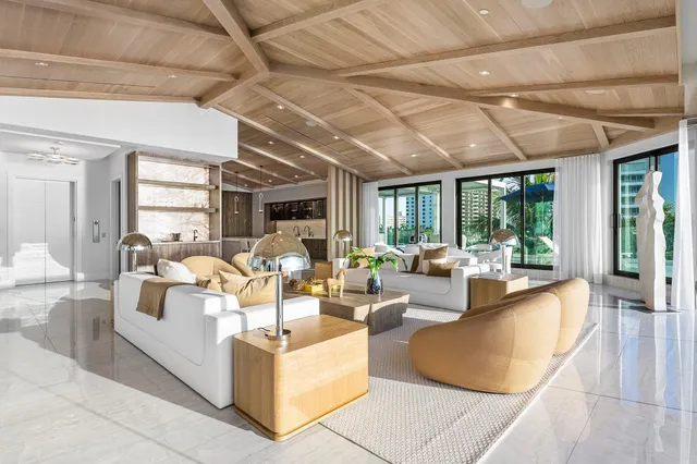 a bedroom with a large bed and a couch