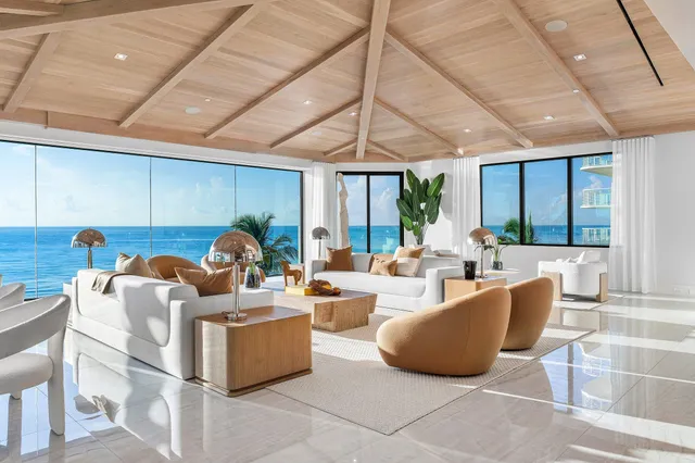 a bathroom with a tub shower and sink