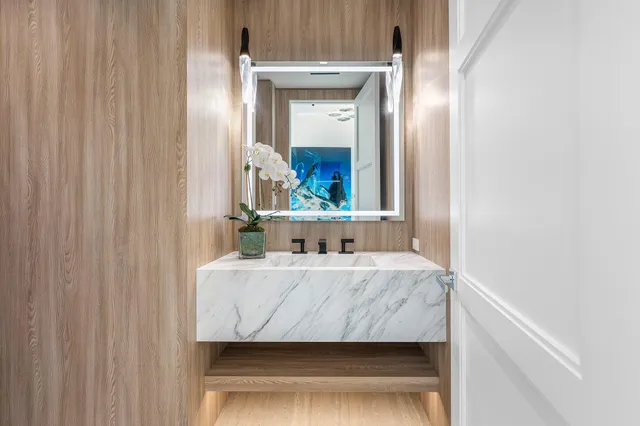 a wooden floor with two chairs