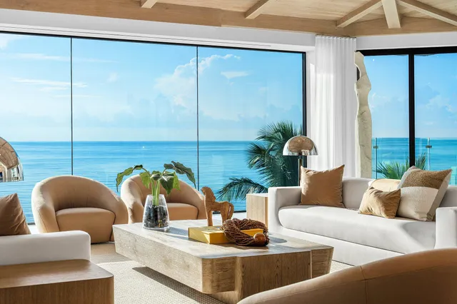 a view of a kitchen with a sink and cabinets