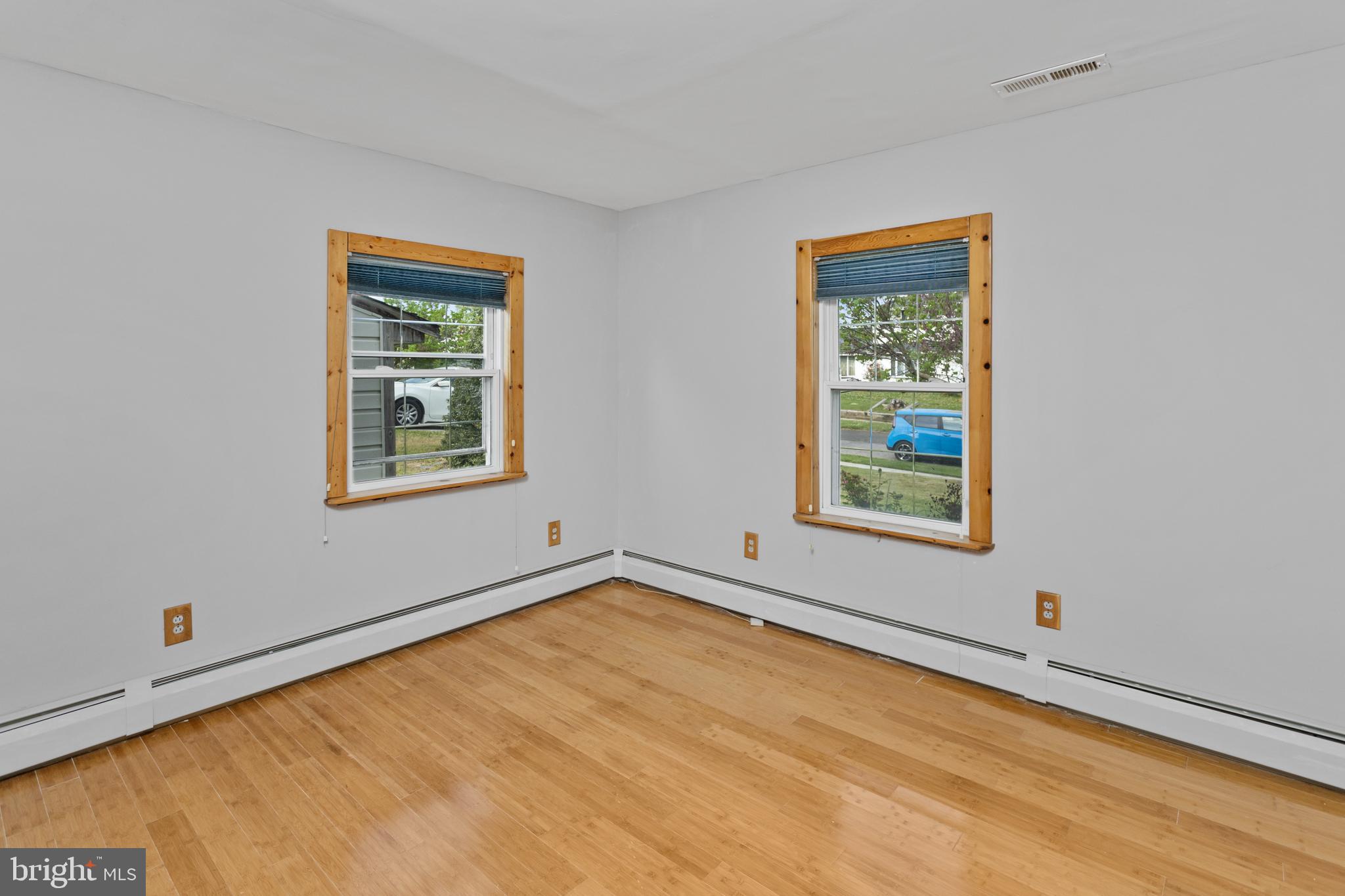 23 Cotton Road Levittown, PA 19057 - Photo 16 of 36 a view of an empty room with a window