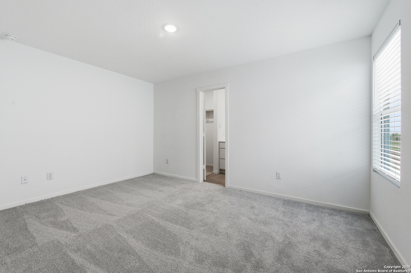 11814 Bluebell Ridge Converse, TX 78109 - Photo 12 of 20 an empty room with windows