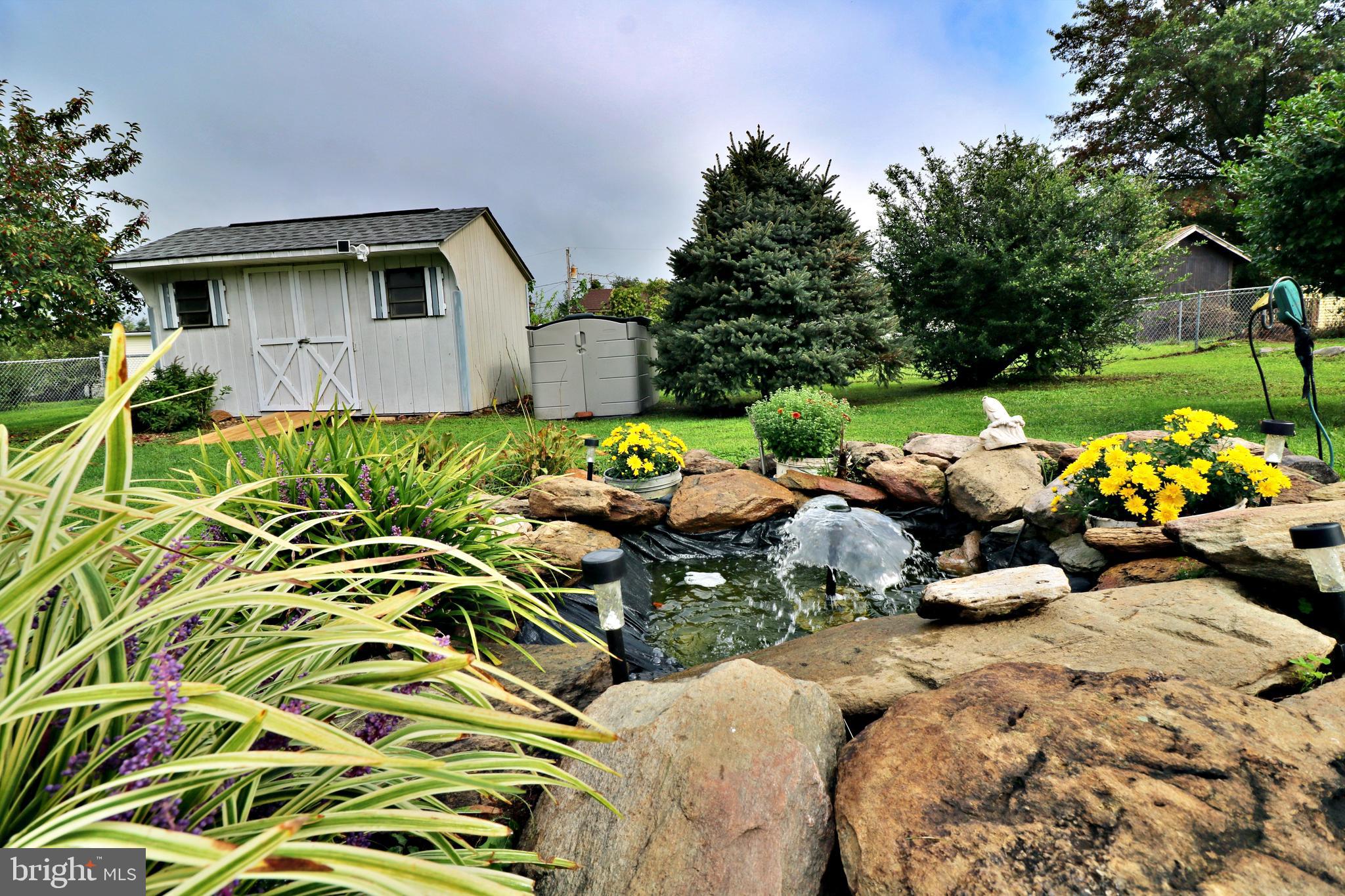 50 Hickory Lane Ranson, WV 25438 - Photo 43 of 44 Storage Sheds & Decorative Pond