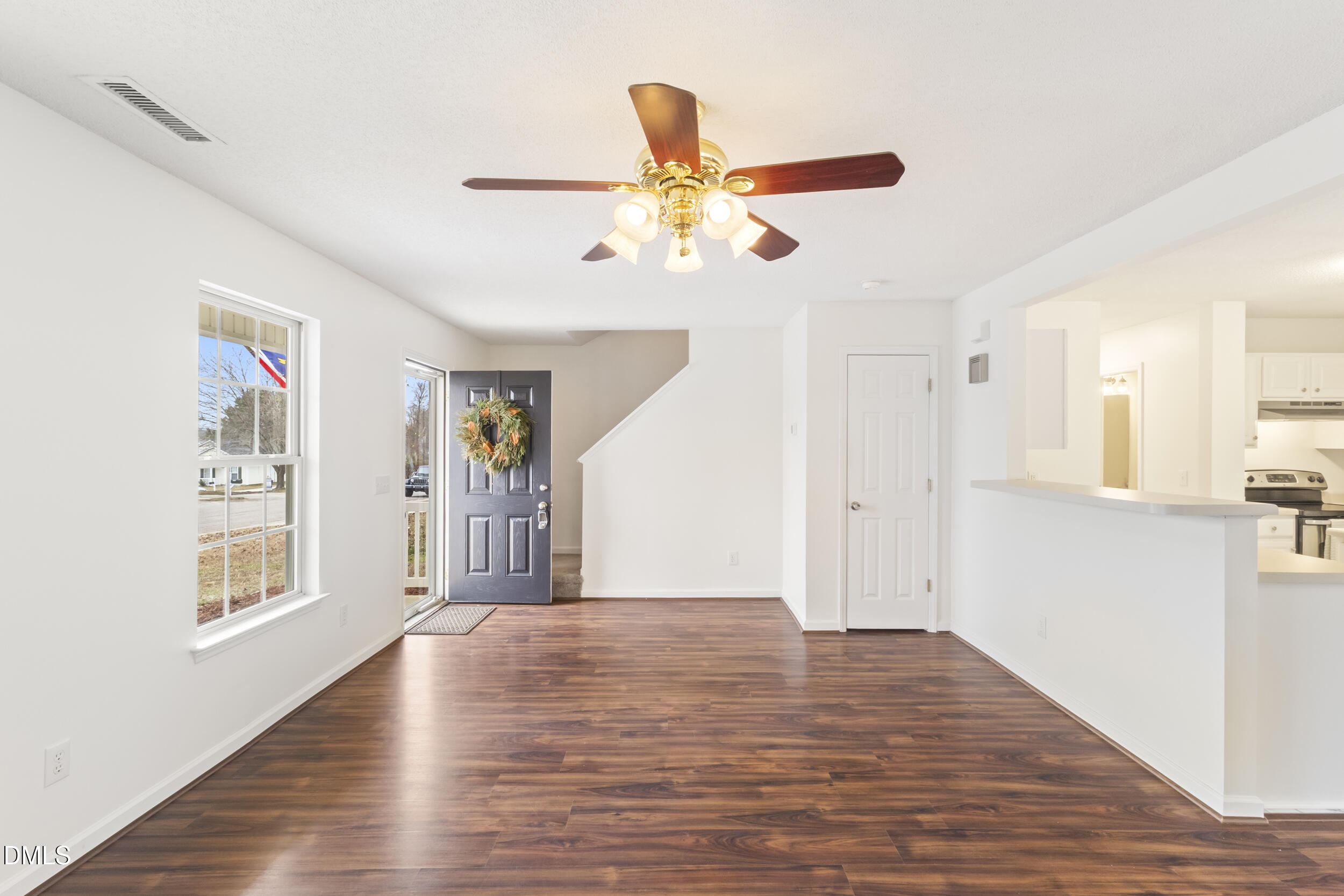 4616 Silverdene Street Raleigh, NC 27616 - Photo 5 of 42 Living room with bar top