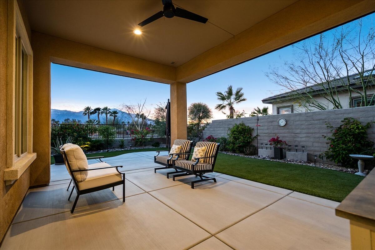 36 Burgundy Rancho Mirage, CA 92270 - Photo 10 of 14 a swimming pool with outdoor seating and a garden