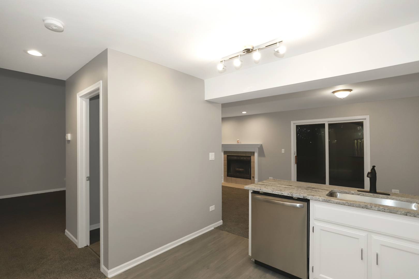 100 Ravinia Drive Shorewood, IL 60404 - Photo 16 of 33 a kitchen with a sink and an oven