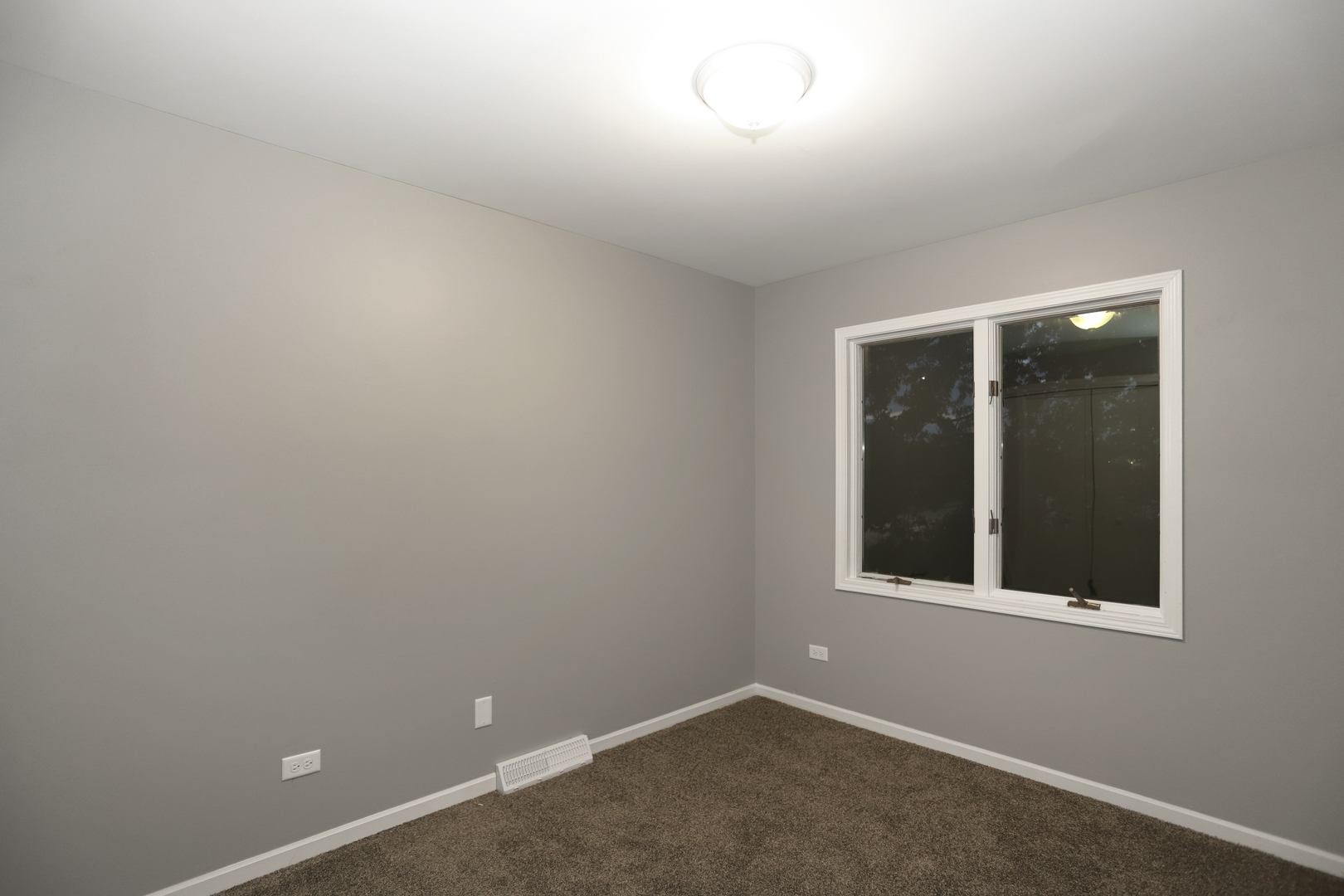 100 Ravinia Drive Shorewood, IL 60404 - Photo 24 of 33 an empty room with a window