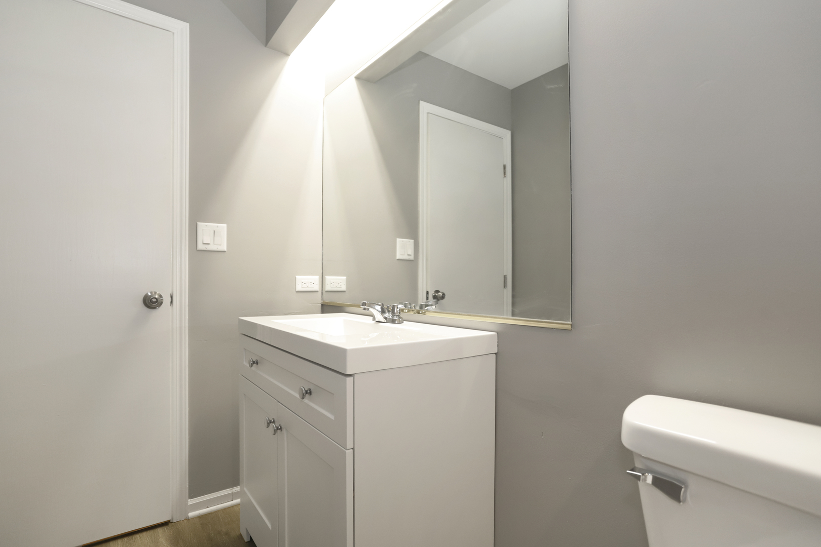 100 Ravinia Drive Shorewood, IL 60404 - Photo 30 of 33 a bathroom with a sink and a toilet