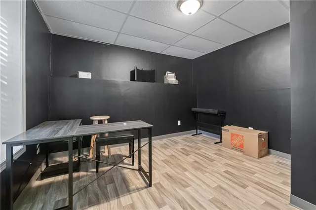 a room with furniture and wooden floor