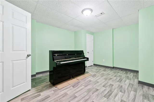 a view of kitchen and wooden floor