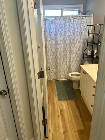 a bathroom with a sink and toilet