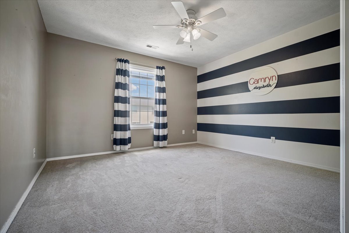 1704 Sunrise Point Normal, IL 61761 - Photo 19 of 33 a view of an empty room with a window