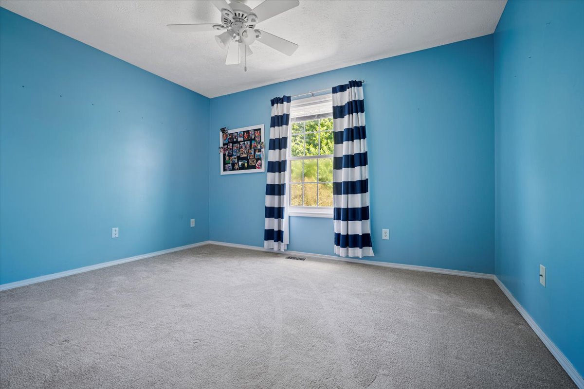 1704 Sunrise Point Normal, IL 61761 - Photo 20 of 33 an empty room with a empty space and window