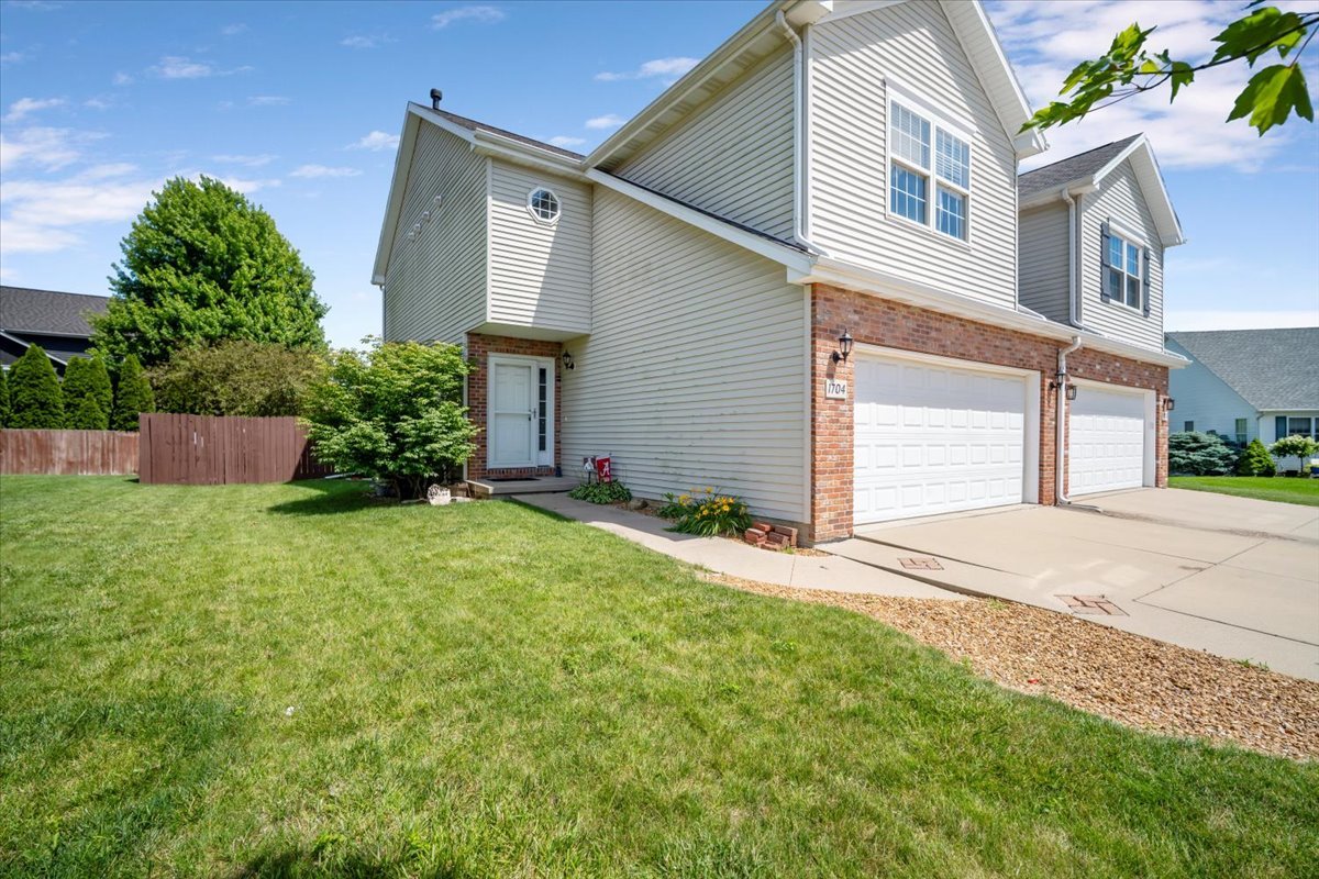 1704 Sunrise Point Normal, IL 61761 - Photo 31 of 33 front view of a house with a yard