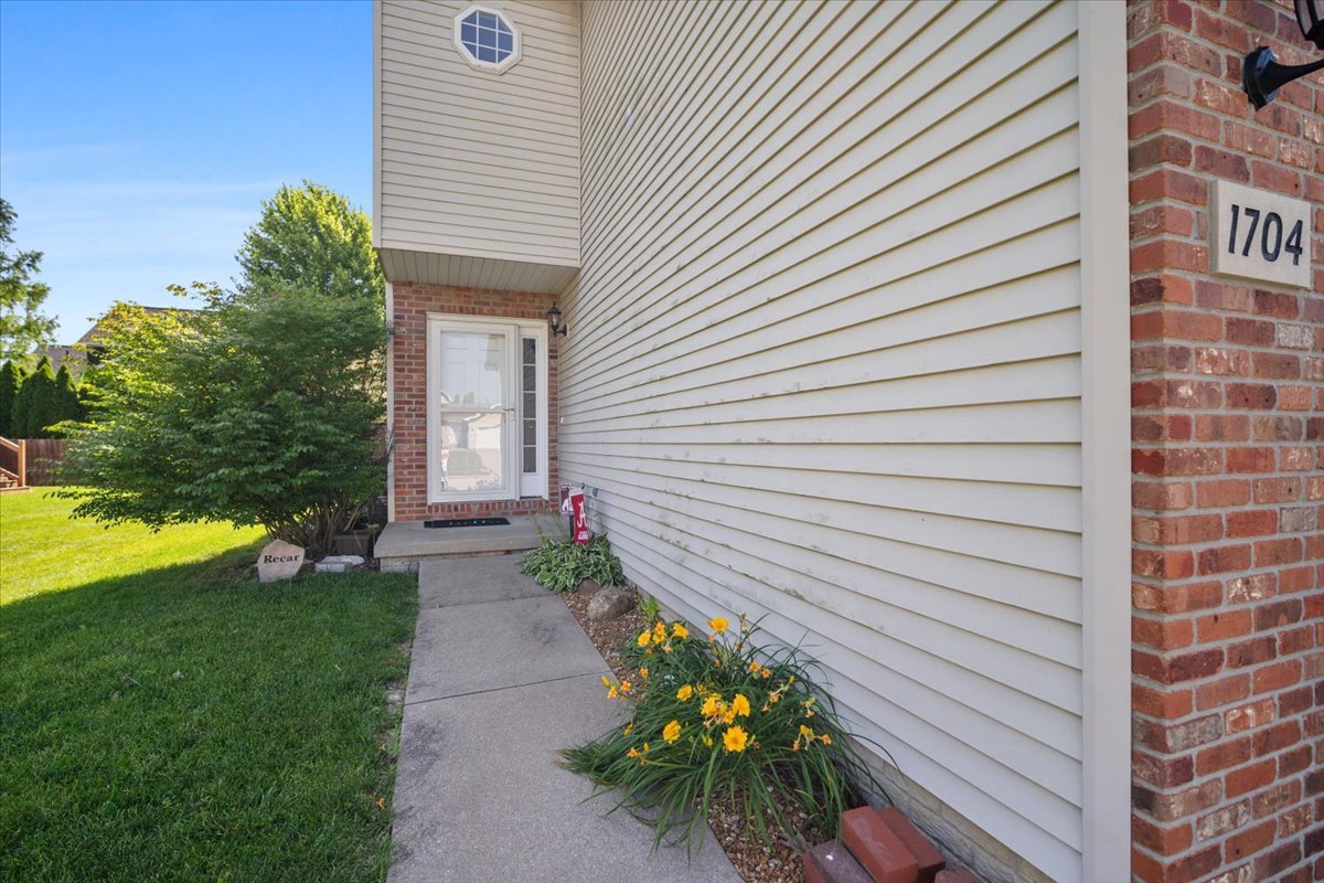 1704 Sunrise Point Normal, IL 61761 - Photo 32 of 33 a house view with a garden space