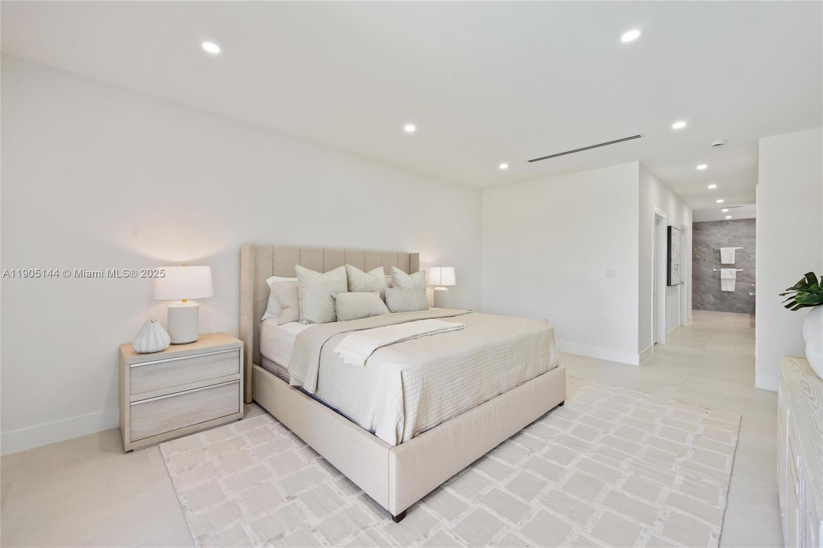 2127 Southwest 11th Terrace Miami, FL 33135 - Photo 13 of 28 a large white bed in a white room